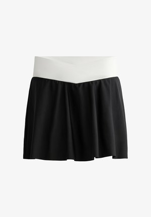 Schwarzer Skort mit einem weißen, gekreuzten Bund. Verfügt über ein ausgestelltes Design, leichten Stoff und glatte Textur. Eignet sich für aktive Freizeitbekleidung.