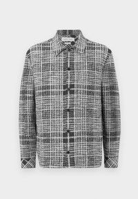 Γκρι και μαύρο πουκάμισο καρό με κουμπιά μπροστά, μυτερό γιακά και μακριά μανίκια, φτιαγμένο από υφή και με ποικιλία σε σχέδια πλέγματος.