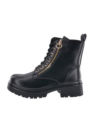 Bottine en cuir noir avec fermeture éclair dorée, devant à lacets, semelle en caoutchouc épaisse et tirette sur le côté. Caractéristiques d'une texture lisse et de coutures renforcées.