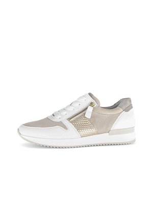 Sneakers featuring a combination of white leather and light beige suede, a textured gold accents, and a zip closure on the side.