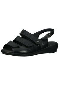 Zwarte leren sandalen met open teen, drie verstelbare banden, gegraveerd bloemenpatroon en een lage wiggenhak. Enkelbandje met gesp.