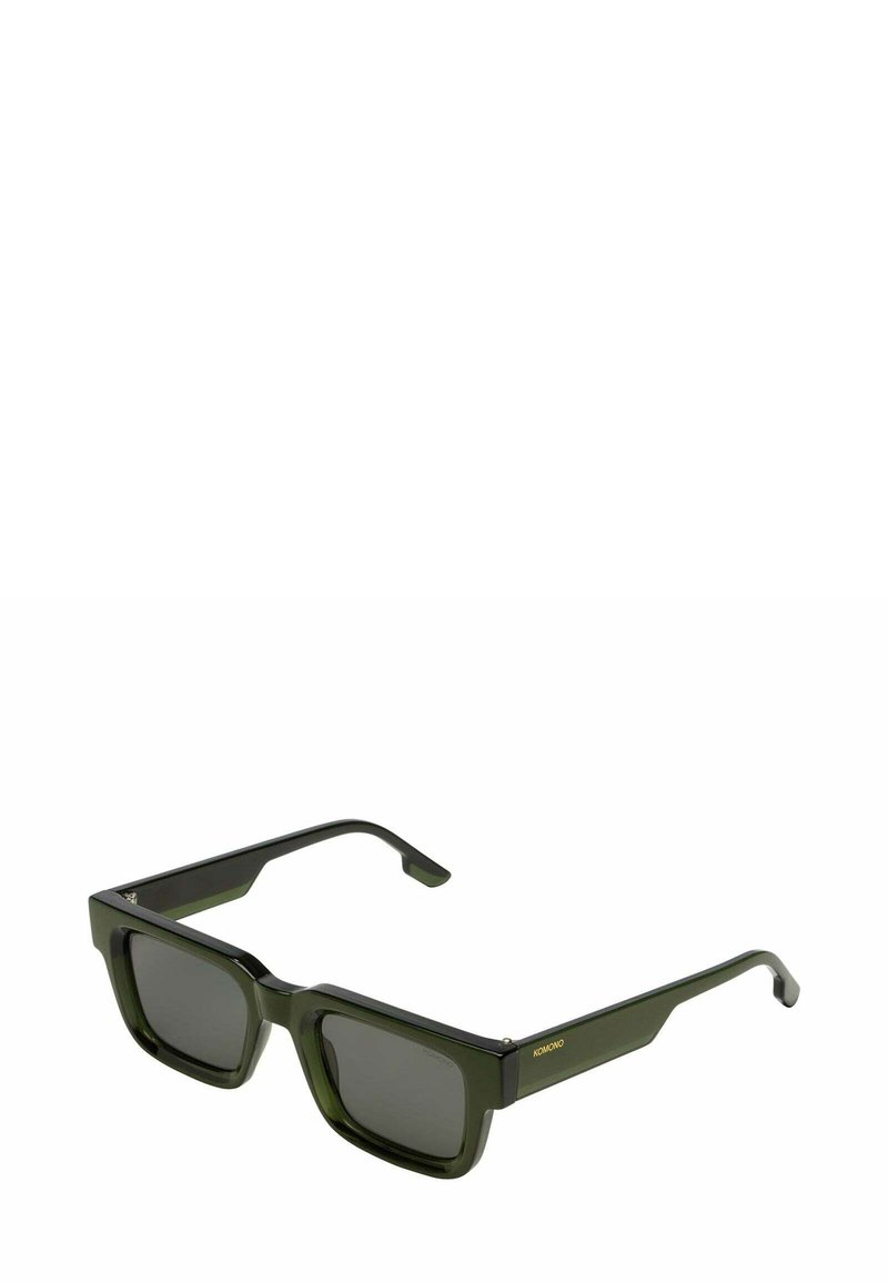 Vierkante groene zonnebril met donkere glazen, een dik kunststof frame en een gouden logo-accent aan de zijkant. Strak, modern ontwerp.