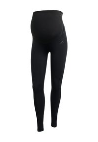 Leggings de maternité noirs avec une ceinture extensible au-dessus du ventre, en tissu flexible, conçus pour le confort et le soutien.