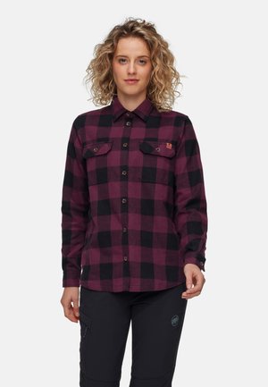 Flannel shirt in purple and black checkered pattern, featuring a button-up front, two chest pockets, and a small logo patch.
