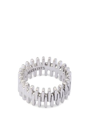 Silver metal ring with a zigzag pattern, textured surface, and a smooth interior. Features a brand name engraved inside.