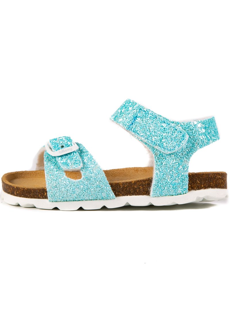 Sandale turquoise pailletée avec deux straps réglables, semelle en liège et semelle en caoutchouc blanc. Présente un dessus texturé et scintillant.