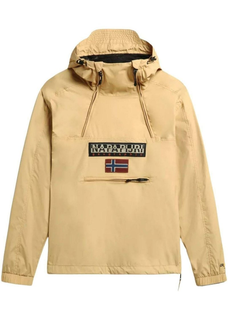 Beige anorakjacka med en svart och vit logotyp samt norsk flagga. Har en halvdragkedja fram och justerbar huva med dragsko.