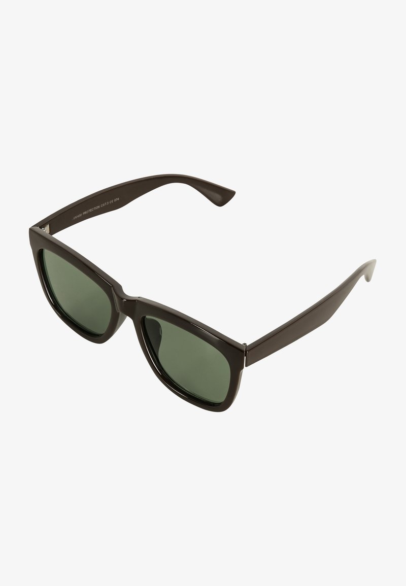 Ruske plastične naočale s zelenim staklima, odvažnog pravokutnog oblika i glatke teksture. Ima metalne akcentne na okviru.