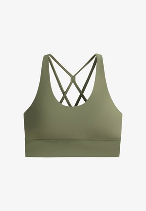Brassière de sport vert olive avec encolure arrondie et doubles bretelles croisées dans le dos, design sans coutures et taille élastique.