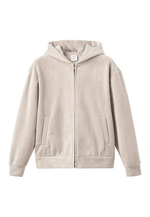 Felpa con zip beige realizzata in tessuto texturizzato, dotata di un cappuccio ampio, due tasche frontali e polsini a coste. Design semplice, superficie liscia.