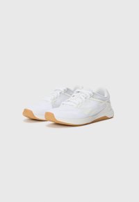 White athletic shoes made of mesh and synthetic materials, featuring a rubber sole, rounded toe, and lace-up design with light gray accents.