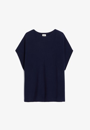 Navyblauwe top met korte mouwen, in een losse, oversized pasvorm, ronde halslijn en zachte textuur, ontworpen voor comfort en bewegingsvrijheid.