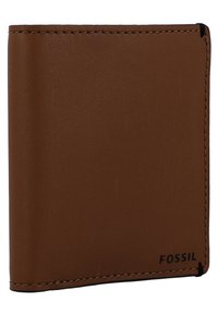 Brown leather wallet with a smooth texture and stitched edges, featuring the brand name "FOSSIL" embossed on the bottom right corner.