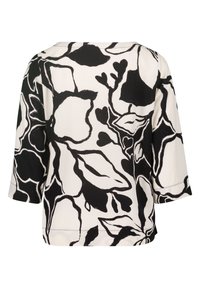 Blouse à motifs floraux en noir et blanc, avec une coupe décontractée, des manches 3/4 et un col arrondi, présentant des contours contrastés de feuilles et de fleurs.