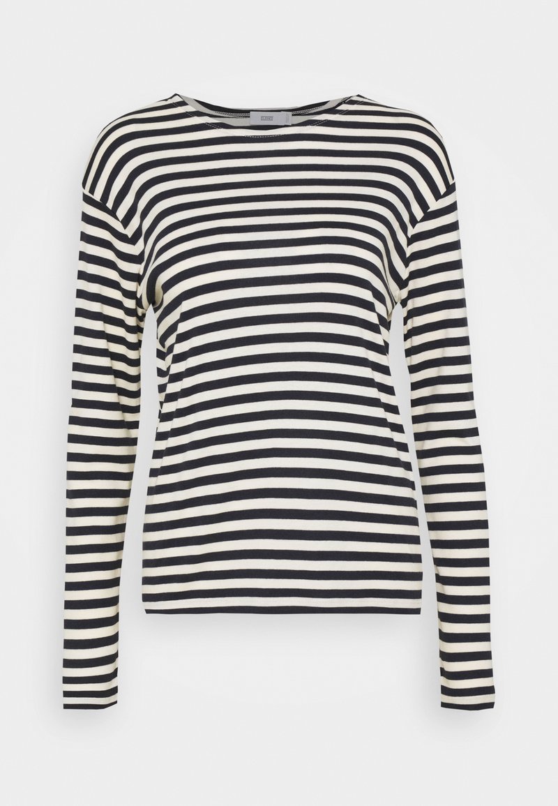 Maglietta a maniche lunghe a righe con strisce orizzontali alternate in navy e crema, scollo rotondo e vestibilità comoda. Tessuto morbido.