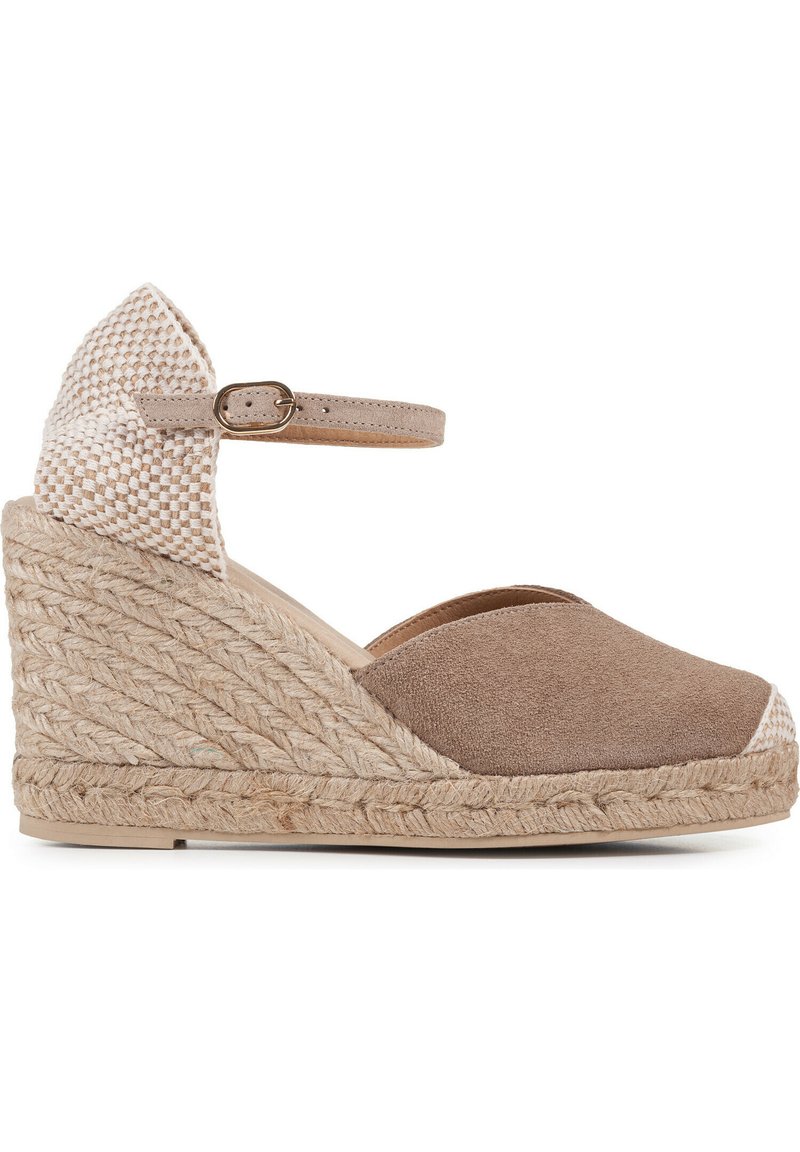 Brown suede wedge espadrille with woven beige accents, open toe, ankle strap, and jute-wrapped platform. Textured and contemporary design.