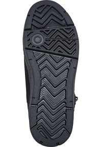 Suola in gomma nera con un motivo a zigzag per la trazione, dotata di scanalature e rilievi per una migliore presa e durata.