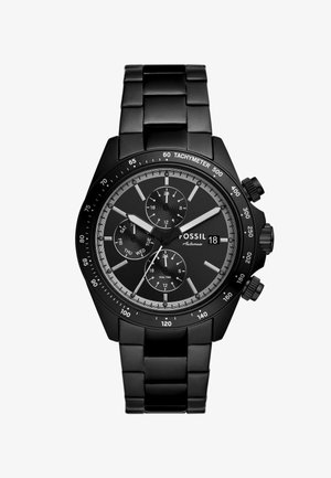 Montre chronographe en acier inoxydable noir avec finition mate, dotée d'un cadran noir, de trois sous-cadrans, et d'une lunette tachymétrique.