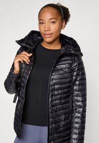 Norrøna TROLLVEGGEN SUPERLIGHT HOOD - Tolldzseki - caviar black