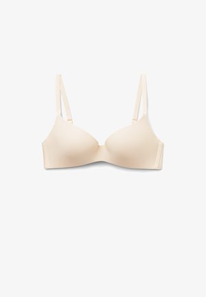 Beige gevoerde bh met verstelbare bandjes, gladde stof en naadloos ontwerp. Voorzien van een haak-en-oogsluiting aan de achterkant.
