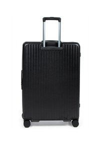 Valigia rigida nera con scanalature verticali, manico retrattile e quattro ruote nere per una facile mobilità. Texture liscia e design robusto.