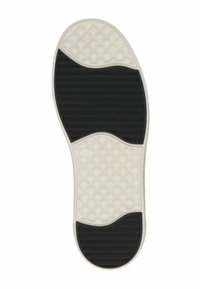 Rubber shoe sole with a white base, featuring a textured black grid pattern and diamond-shaped treads for traction.