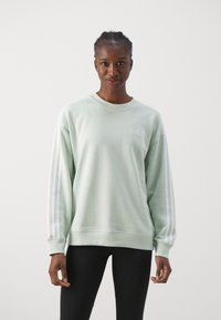 adidas Sportswear ESSENTIALS 3 STRIPES - Φούτερ - linen green
