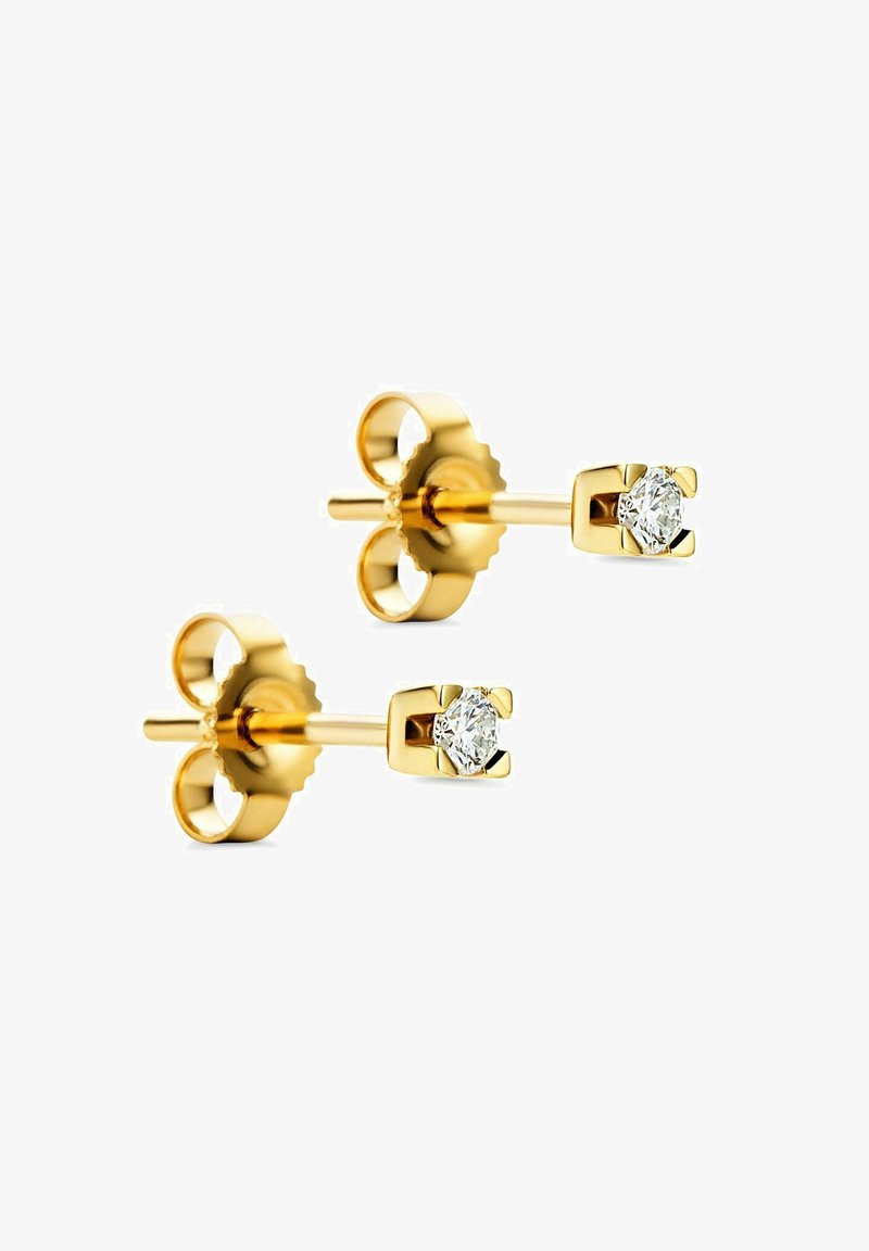 Gold stud earrings feature a round clear stone setting with a textured, flared back for secure fastening. Smooth, polished finish throughout.