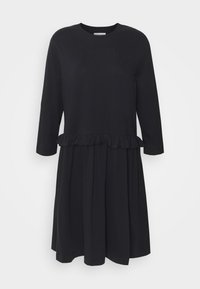 Svart klänning med långa ärmar, rund halsringning, volangmidja och utsvängd kjol. Tillverkad av ett mjukt, lätt tyg.