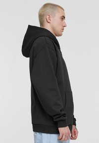 Karl Kani HOODED CHEST SIGNATURE ESSENTIAL - Cipzáras pulóver - black