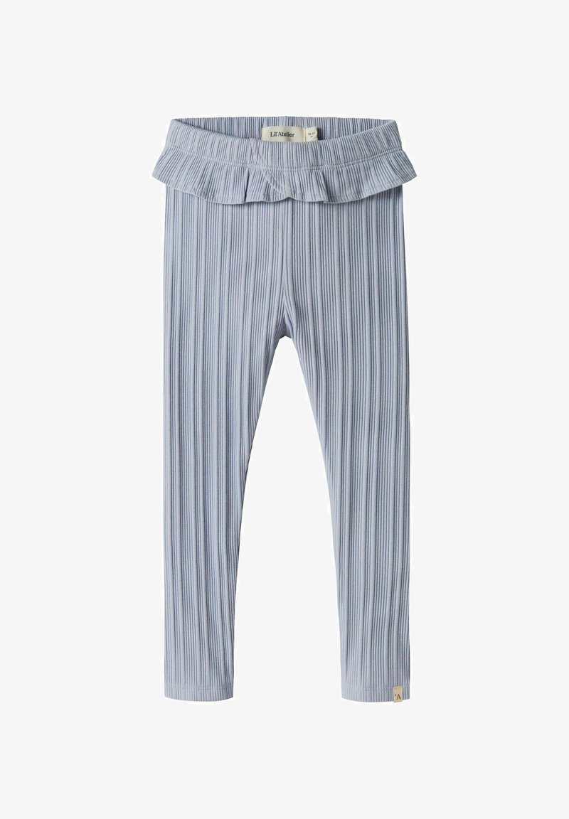 Leggings bleu clair en tissu côtelé avec une taille à volants. Caractérisés par une coupe ajustée et une petite étiquette sur l'ourlet inférieur.