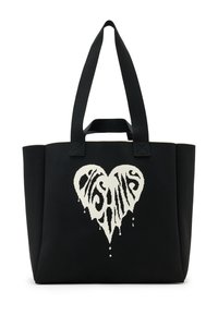 Sort mulepose lavet af holdbart stof, med et hvidt dryppende hjerte-design og snoet tekst i midten. Dobbelte stofremme til bæring.