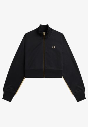Giacca nera corta con cerniera dorata e piccolo logo corona d'alloro dorato sul petto, polsini e colletto a coste.