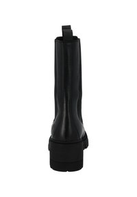 Black leather ankle boot with a smooth finish, high shaft, and a reinforced back pull tab. Thick black rubber sole for added height.