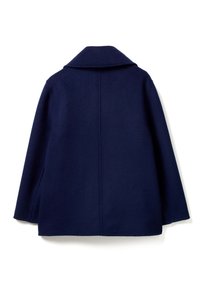 Cappotto in lana blu navy con colletto a intagli, forma oversize e linee pulite. Presenta una singola cucitura centrale e un design minimalista.