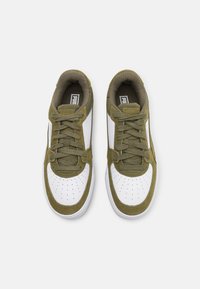 Green suede and white leather sneakers feature perforated toe, matching laces, and padded collar. White rubber sole provides traction.