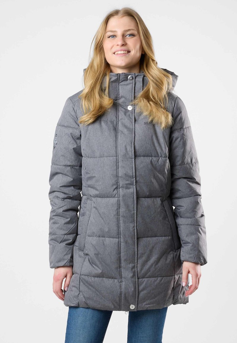 Gray puffer jacket with a textured finish, featuring a high collar, snap closure, and quilted design. Hooded with side pockets.