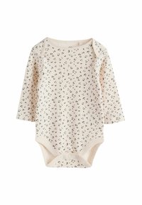 Langarm-Baby-Overall aus weichem beigem Baumwollstoff mit einem verstreuten schwarzen Leopardenmuster. Verfügt über Druckknöpfe unten für ein einfaches Ankleiden.