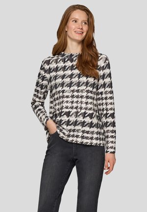 Langärmeliges Oberteil in Schwarz-Weiß mit Hahnentrittmuster, mit rundem Ausschnitt und lockerem Schnitt, gefertigt aus weichem, strukturiertem Stoff.