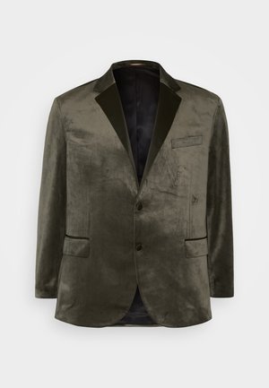 Olīvu zaļš samta žakets ar ieliekamajiem klapjiem, divām priekšējām kabatām un vienu pogu aizdari. Gluda tekstūra un satīna oderes.