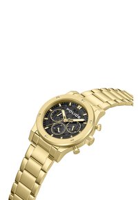 Orologio in metallo dorato con quadrante nero, tre sottomisure e marcatori delle ore audaci. Presenta un bracciale dorato collegato e accenti hardware prominenti.