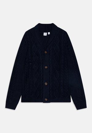 Cardigan bleu marine en maille torsadée avec col châle et quatre boutons marron sur le devant, manches longues, poignets et ourlet côtelés.