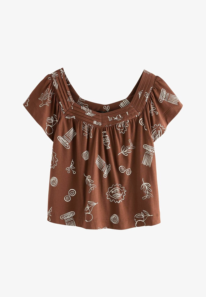 Blouse brune à manches courtes avec encolure carrée, bordure plissée et dessins abstraits blancs de lignes représentant des plantes, des colonnes et de la poterie.