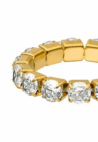 Gouden armband met heldere, ronde kristallen in hexagonale schakels. Soepele, gepolijste textuur met een glanzende afwerking.