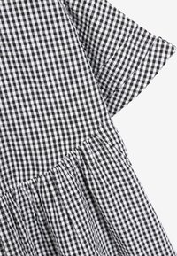 Next OVERSIZED - Sukienka letnia