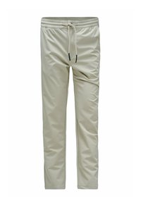 Pantalons de jogging beige clair en tissu lisse et extensible. Dotés d'une taille élastique avec cordon de serrage et de jambes slim droites.