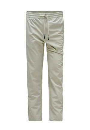 Pantalones jogger de color beige claro, hechos de una tela suave y elástica. Con cintura elástica y cordón de ajuste, y piernas rectas y ajustadas.