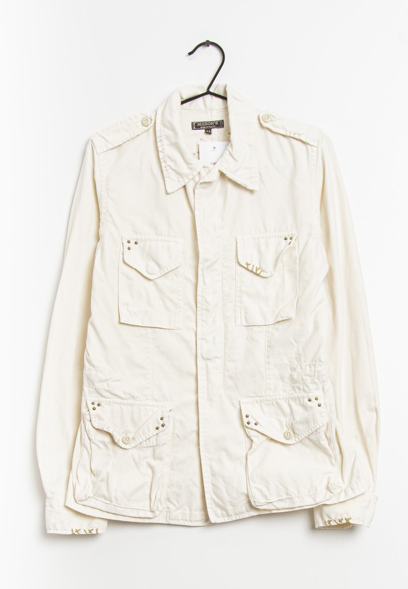 Světlý krémový dlouhý rukáv vojenského stylu kabát s dvěma náprsními kapsami a dvěma dolními kapsami, s patentními knoflíky a dekorativními hroty.