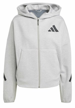Svjetlosiva zip-up veste napravljena od mekog materijala. Ima kapuljaču, dva prednja džepa i crne logotipe na prsima i rukavima.