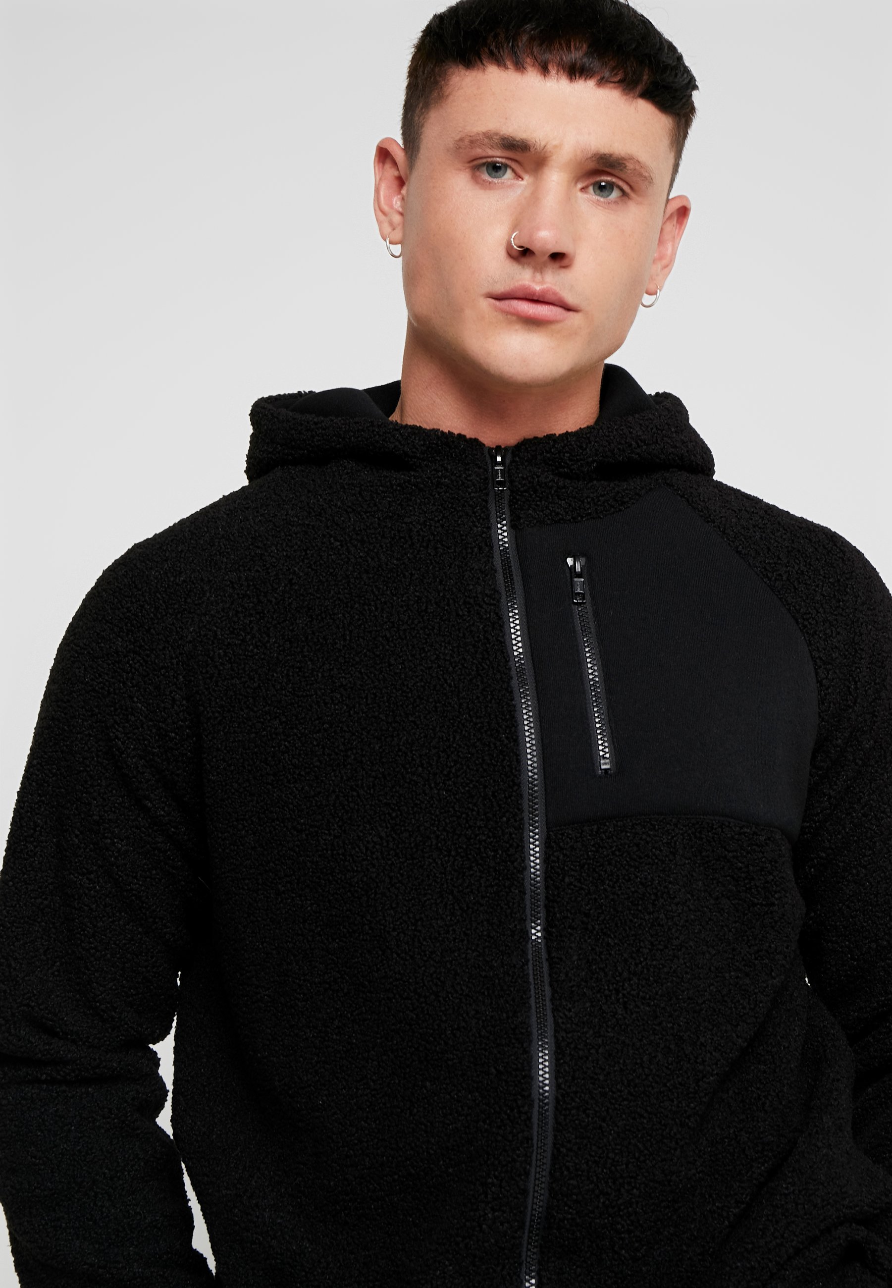 black quarter zip jacket
